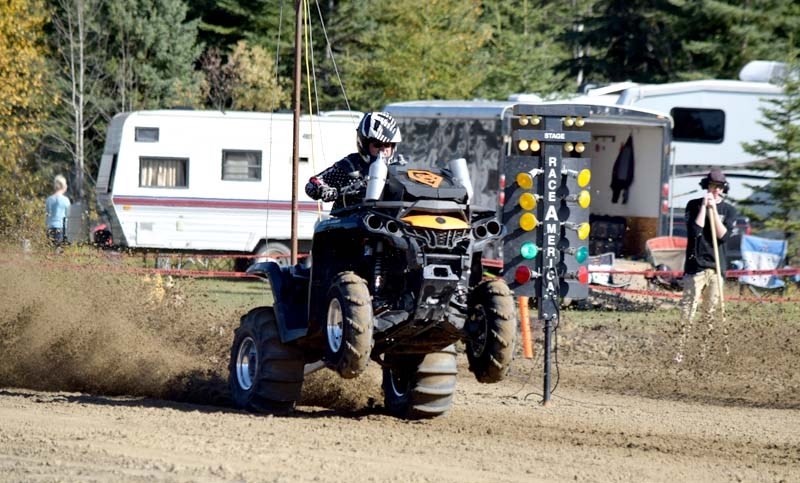 Wayne Barsi pops a wheelie at the start of his heat.