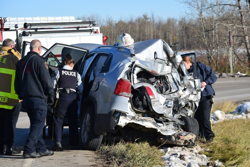 RCMP officers try to piece together the details of a two-vehicle collision.