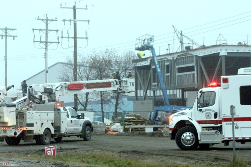 The Barrhead fire department was called to assist construction crew workers in stabilizing an unbalanced Genie S-4 lift machine on Monday, Oct. 24, at the construction site