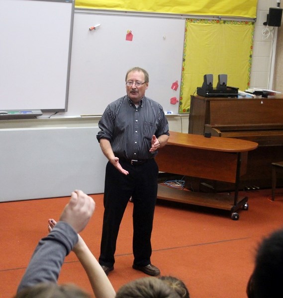 Town of Barrhead mayor Gerry St. Pierre answers questions from Grade 6 students at Barrhead Elementary School on Wednesday, Nov. 2.