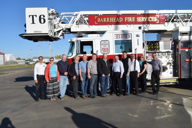 Members of both the town and county of Barrhead joined together in welcoming the fire department &#8216;s latest piece of equipment on Wednesday, Sept. 21.