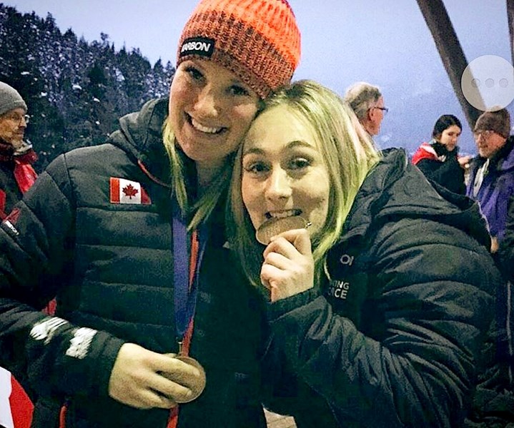 Alysia Rissling (l) and Melissa Lotholz pose after a World Cup race in Whistler.
