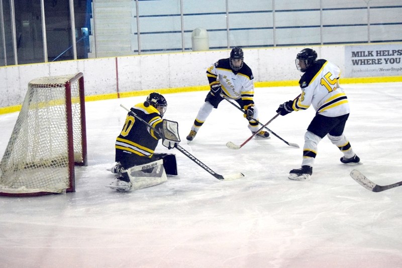Brayden DeRudder &#8216;s second period goal, pictured here going over the goaltender &#8216;s shoulder, tied the game 2-2.