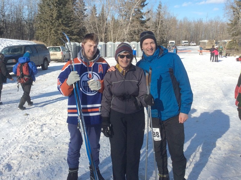 From left: Cameron (son), Rose (sister) and Howard Gelderman pose together for a picture before competing in the Birkie.