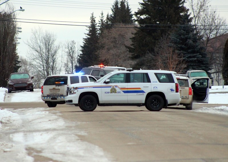 RCMP closed down sections of 46 Street and 52 Avenue from the early morning hours to the early afternoon in an effort to arrest a known criminal, Curtis Powder, on Wednesday, 