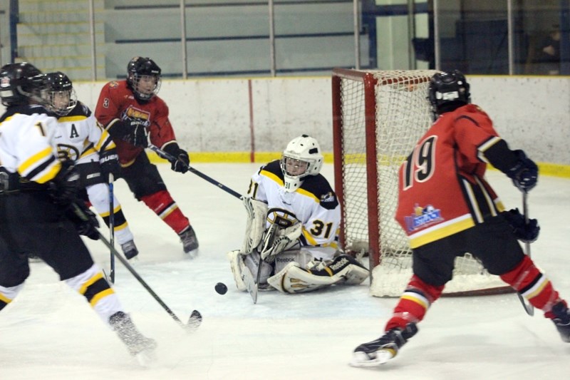 Barrhead Flyers goalie Brady Callihoo faced down 58 shots on net by the visiting Westlock Warriors in a 1660 league peewee bronze-medal game March 16. The game ended 7-11 for 