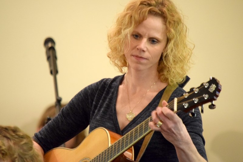 Lee Anne Schmidt accompanies her daughter, Cokee, as part of a Schmidt family performance of Lost Boy, a Peter Pan inspired song. This was the first year the Schmidt &#8216;s 