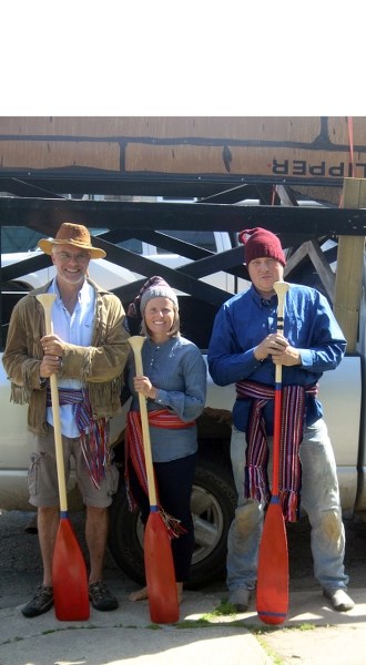 Members of the 16-boat group of canoe-enthusiasts participating in the Athabasca River Brigade &#8216;s celebration of Canada &#8216;s 150th anniversary, Dale Kiselyk (l) and 