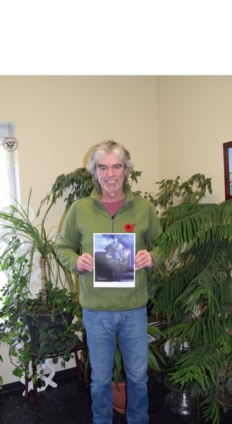 Barrhead Lee Graham holds a picture of his grandfather Lionel Edward Grey who lied about his age to serve in the First World War.