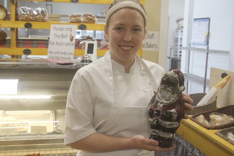 Elien De Herdt, pictured here with a hand-made chocolate Santa, is a former member of Team Canada and the owner of Elieneke &#8216;s Bake Shop in Barrhead.
