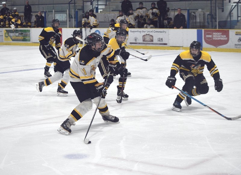 Landon Petiot prepares to take a wrist shot just inside the circle.