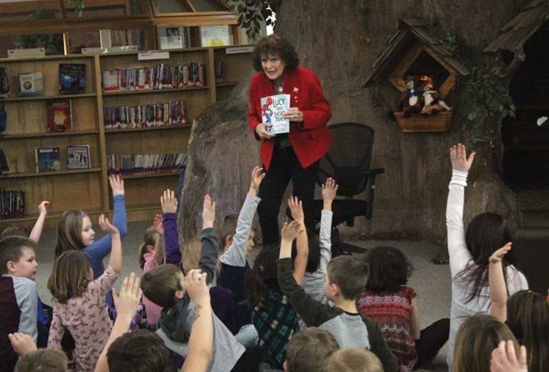Alberta’s Lieutenant-Governor Lois Mitchell answers questions from Westlock Elementary School students in the school’s library during a Jan. 29 visit.