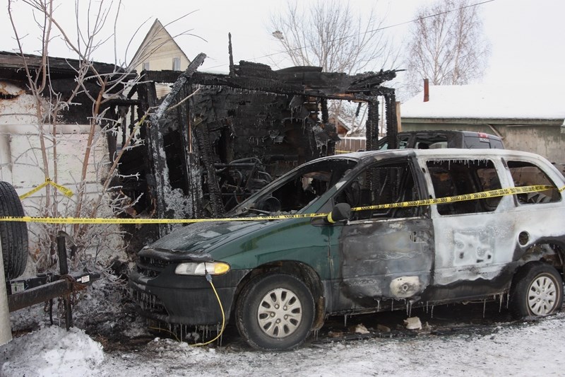 Two vehicles and a garage were destroyed in a Feb. 6 fire in town. The investigation continues, but the fire is not deemed suspicious.