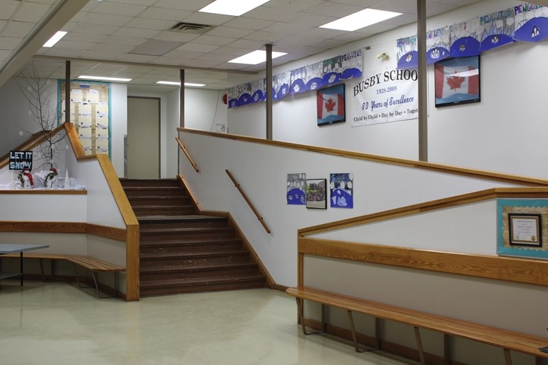 The ramp and stairs in the front lobby at Busby School will be removed this summer to make the building &#8220;barrier-free, &#8221; along with numerous other renovations.