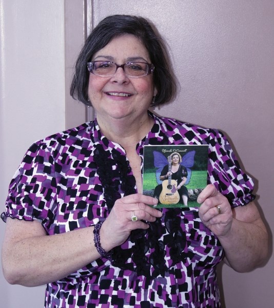 Local singer/songwriter Rhonda O&#8217;Connell shows off her latest work, The Butterfly Project, which she recently pub-lished on CD and electronically. The album is a
