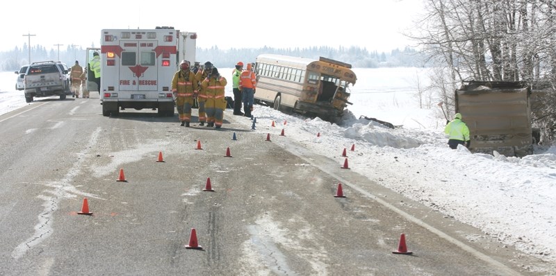A Thorhild Central School student is dead after an early-morning March 7 crash between a semi truck and school bus on Opal Road, just west of Thorhild. RCMP said heavy fog