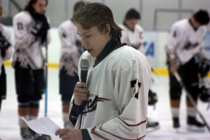 Redwater Rush Midget hockey player Dylan Goulet reads from a speech dedicated to Maisie Watkinson before a March 9 game against Smoky Lake. Watkinson was killed in a bus