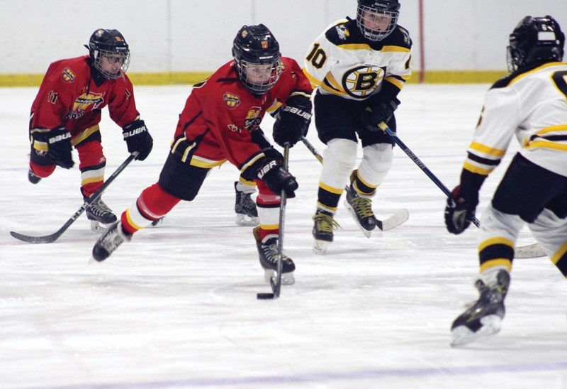 Westlock Atom 1 Warrior Owen McKenna skates towards Barrhead&#8217;s net during the club&#8217;s 4-1 win over the Bruins in a league consolation game March 13 held at the