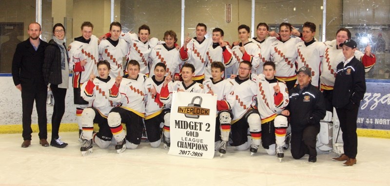 The Westlock Midget Warriors are Tier 2 1660 Hockey League champions following their 2-1 series win over Wetaski-win. Back row, L-R: assistant coach Braden Conquergood,