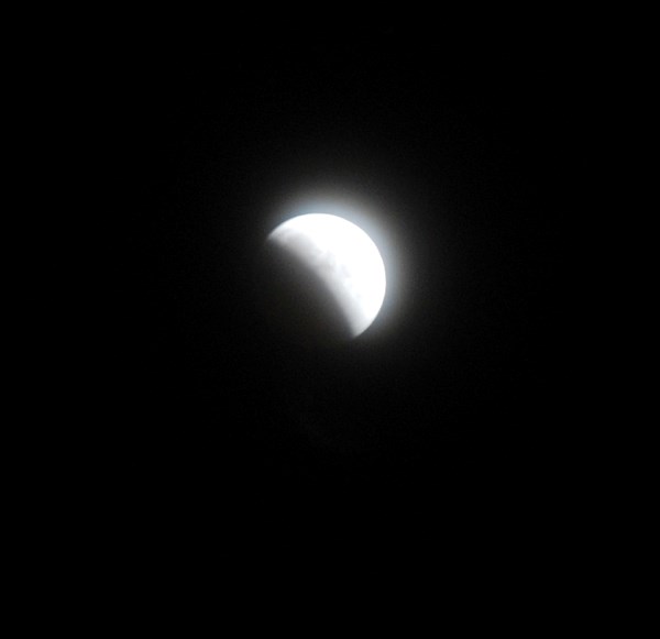 This photo shows the shadow of the earth partially covering the moon at 12:07 a.m. Dec. 21.