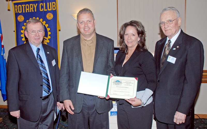 Tom and Sue Vesely (centre) received the Pembina Hills Exemplary Community Partner Award on Jan. 15 at the Westlock Rotary Club&#8217;s 43rd annual Charter Night. The award