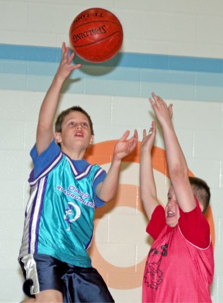 Dapp&#8217;s Matthew Rottier goes for a two-pointer during the boys final match between WES and Dapp. Dapp beat WES 26-20 to claim the championship.