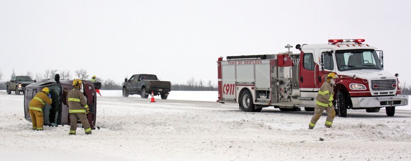 Members of the Westlock Fire Department respond to a rollover on Highway 44 just north of the Pickardville turnoff Thursday morning. Emergency crews were kept busy with more