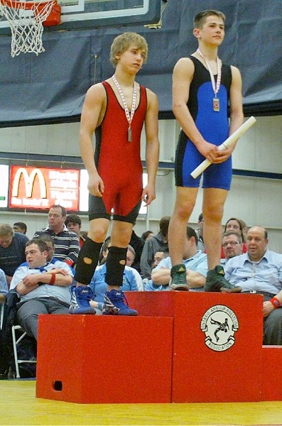 Austin Tremblay, a Grade 10 student at R.F. Staples (left), netted a silver medal at the National Wrestling Championships in Essex Ont. last weekend.