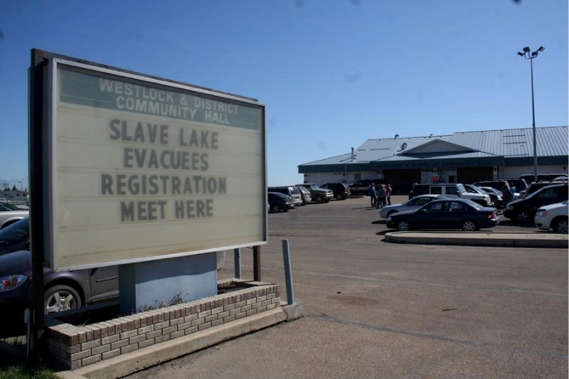 A sign outside of the Westlock and District Community Hall directs evacuees from the Slave Lake area to the temporary shelter set up inside. Westlock hosted several hundred