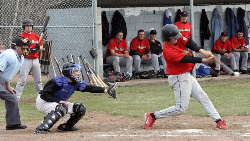 Trevor Miller hits into a fielder&#8217;s choice in the fourth inning of the Red Lions&#8217; first game of the season in Edmonton May 8.