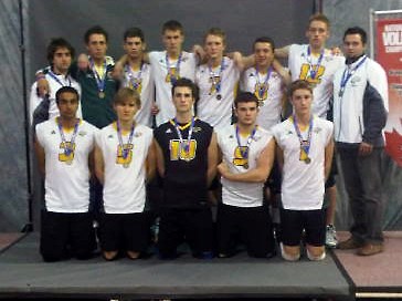 Mark Ritter and his Northern Alberta Volleyball Club (NAVC) Green Bears teammates celebrate their gold medal at Nationals.