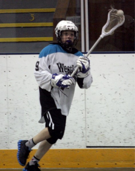 Pee wee Rock Chris Sturkenboom makes a pass during the team&#8217;s loss to the visiting Edmonton Blues June 11 at Jubilee Arena.