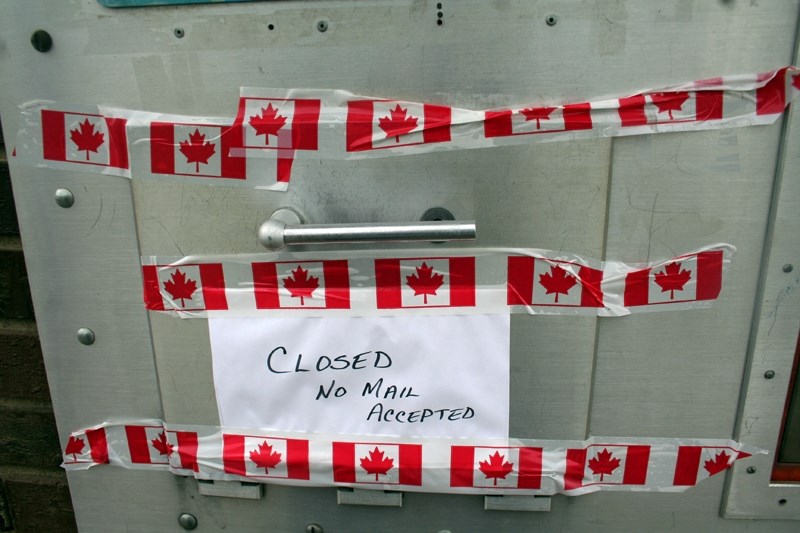 The mail slot at the Westlock Canada Post office is sealed.