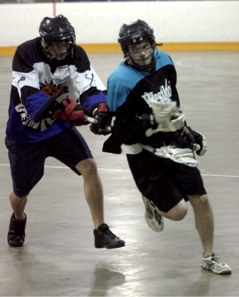 Westlock Rock Les Dunford runs up the floor during the junior team&#8217;s 12-6 loss to Vermilion Roar June 25 at Jubilee Arena.