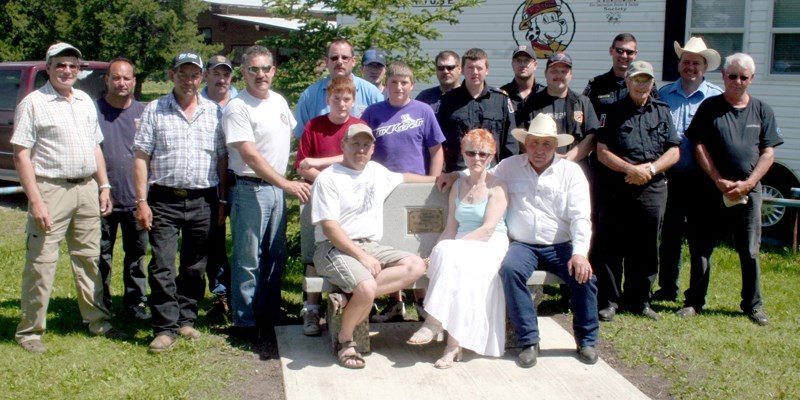 Family and friends of the late Jim Pankonin gathered at the Pickardville Fire Hall last Saturday to dedicate this concrete bench and tree behind it in his memory. Pankonen