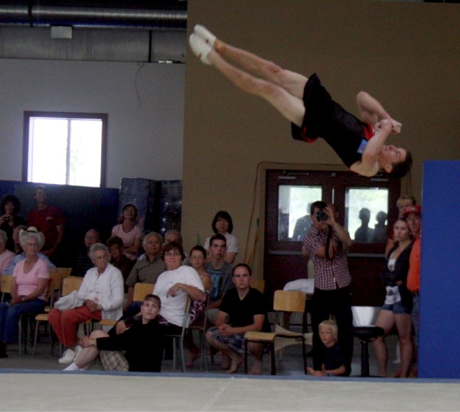 Scott Morgan, one of Canada&#8217;s Olympic hopefuls, spun through the air during his floor routine during a training camp in Tawatinaw last week, impressing a small group of 