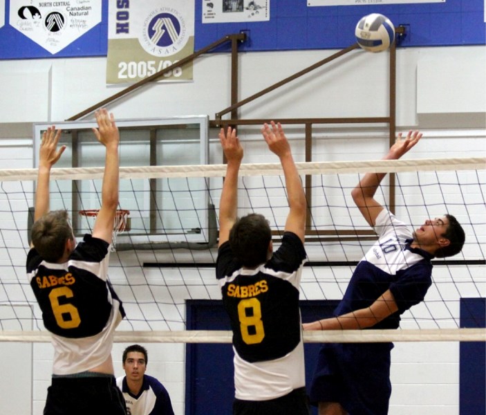 St. Mary Shark Taylor Doblanko looks for a hole in Wetaskiwin Sabres&#8217; front line during their game on Saturday, Oct. 1. The Sharks went undefeated at their home