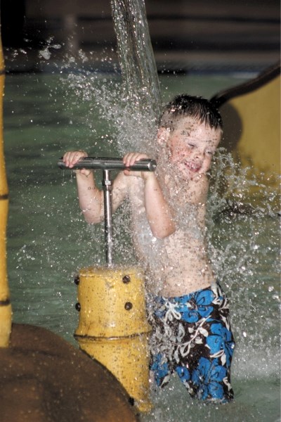 Dale Jespersen, 5, tries out the new spray park at the Westlock Recreation Centre. The $117,000 project was a joint initiative between the Town of Westlock, Westlock County