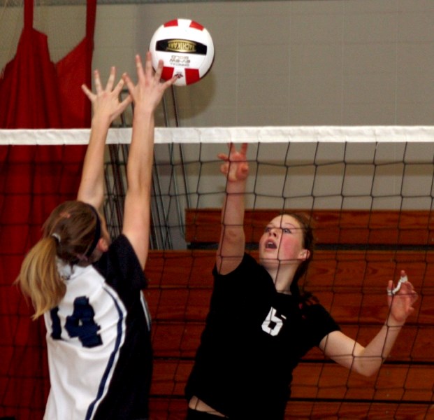 T-Bird Brittany van de Ligt has a shot blocked by an Edson Pacer during a Saturday morning round robin game. The T-Birds again beat the Pacers in the semi-finals, but lost