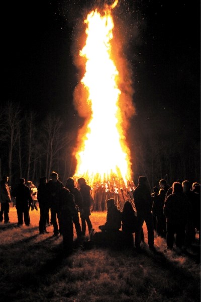 Roughly 120 spectators took in the Guy Fawkes celebration on Saturday, Nov. 5 in Busby. Lit torches led the way through the bushes and were eventually used to ignite a