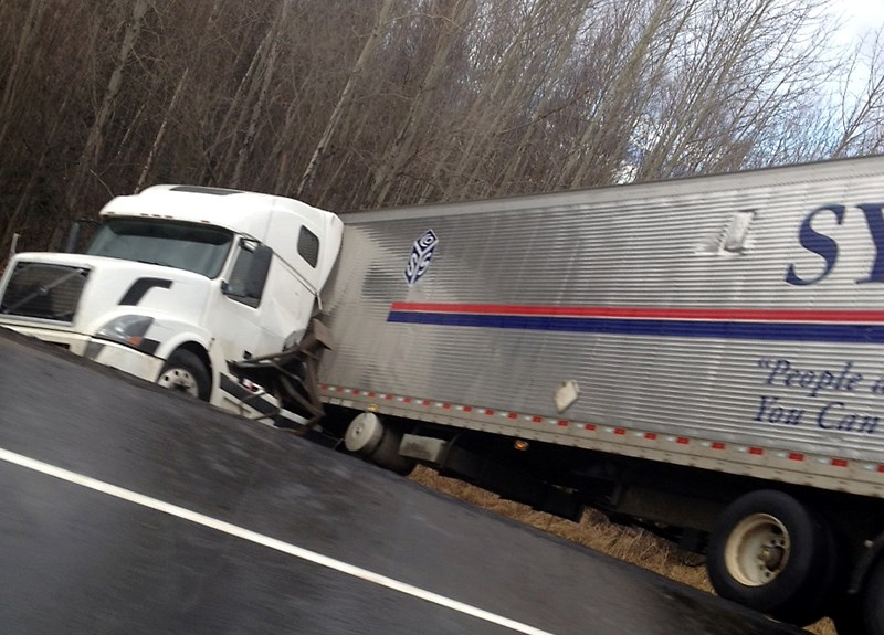 Icy conditions earlier this month were a factor in this semi-truck going off the road in Westlock County. RCMP are urging caution as winter descends on the region.