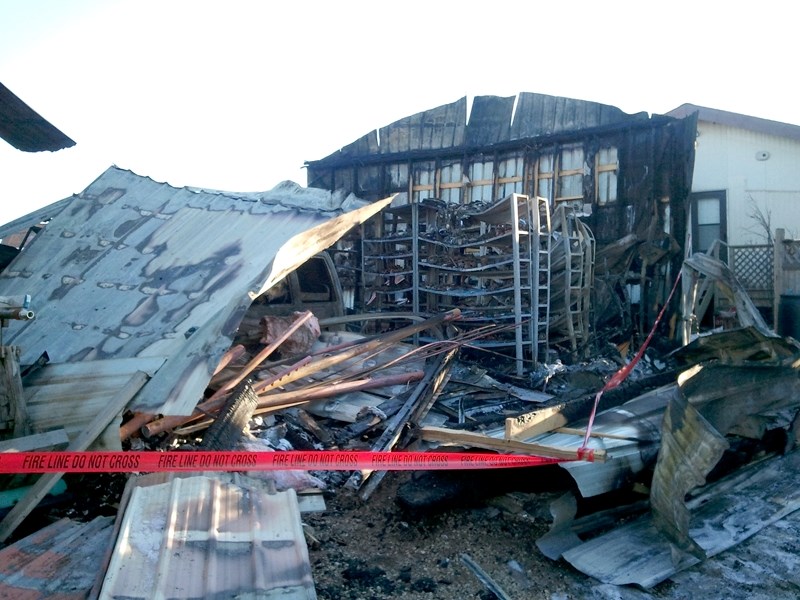 The scene following a Dec. 24 fire that gutted a Whissellville garage.