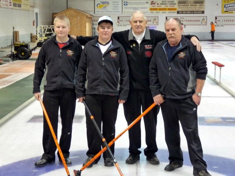 Three generations of Wildfongs took the &#8216;A&#8217; division title at the Town and Country Bonspiel in Westlock Jan. 6-8. From left, Matthew and Christopher Wildfong with 
