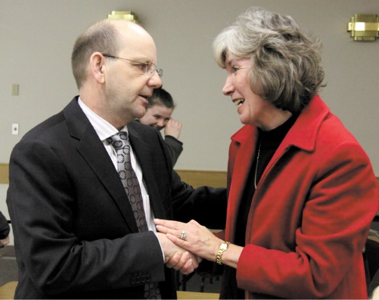 Candidate Tim Schultz offers congratulations to newly-crowned Progressive Conservative nominee Maureen Kubinec after she won the nomination with 561 votes Jan. 28.
