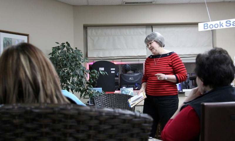 Author and brain tumour survivor Claudette Brown read excerpts from her novel Searching for Heaven on the Road Through Hell, to about a dozen Westlock Library patrons on