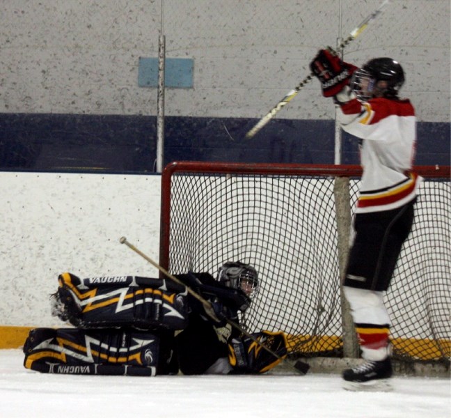 Westlock Sabres&#8217; Ryan Latimer celebrates the game-winning goal by teammate Jordan Boulerice, who scored with roughly five minutes left on the clock. The Sabres beat