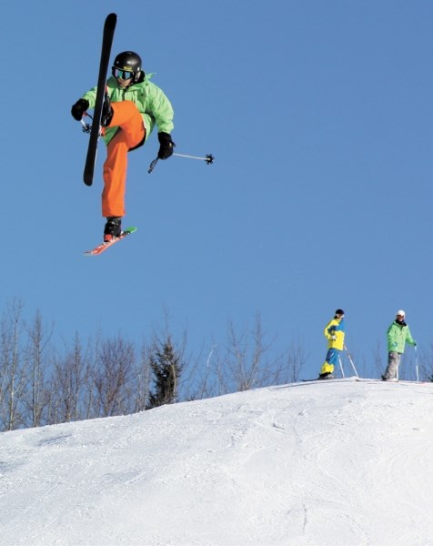 Jesse Keats pulls out a trick called a daffy while other members of the Tawatinaw Valley Freeriders watch during the club&#8217;s practice last Saturday. Keats and six other