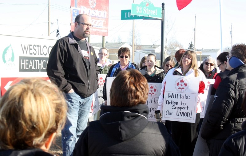 Erez Raz, a vice-president with the Alberta Union of Public Employees, updated hospital support staff in Westlock about wildcat strikes that took place across the province