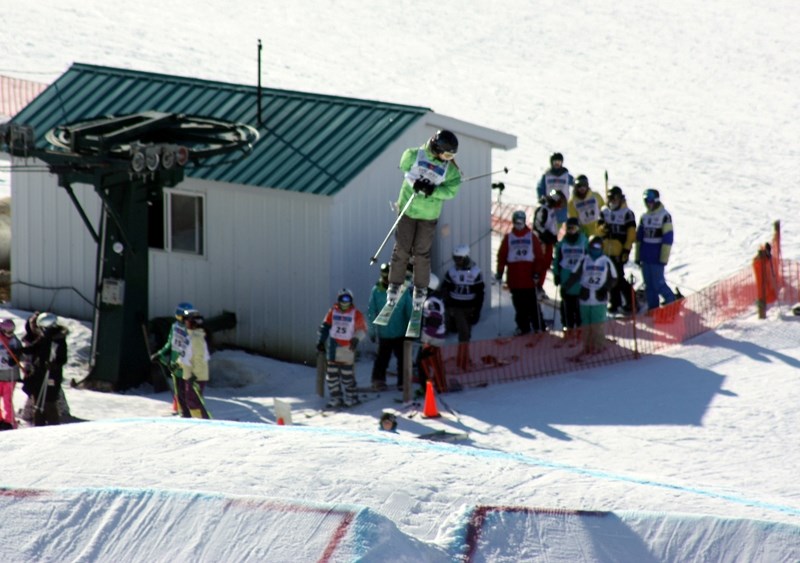 Kara Siegle landed a tough 360 in her second run at the slopestyle course at the 2012 Alberta Winter Games, earning a silver medal. She was the only local medalist at the