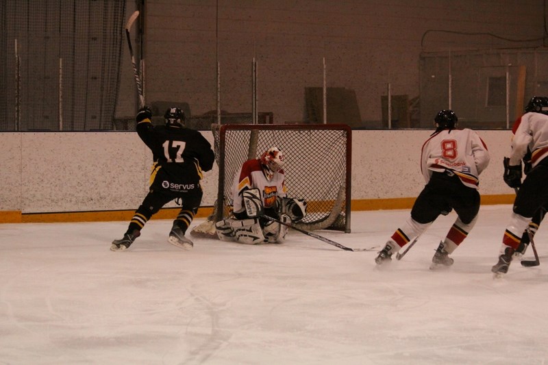 Westlock Sabres goalie Colin Decker let a puck slip into the crease late in the third period during the team&#8217;s 5-4 playoff victory over the Barrhead Renegades on Friday 